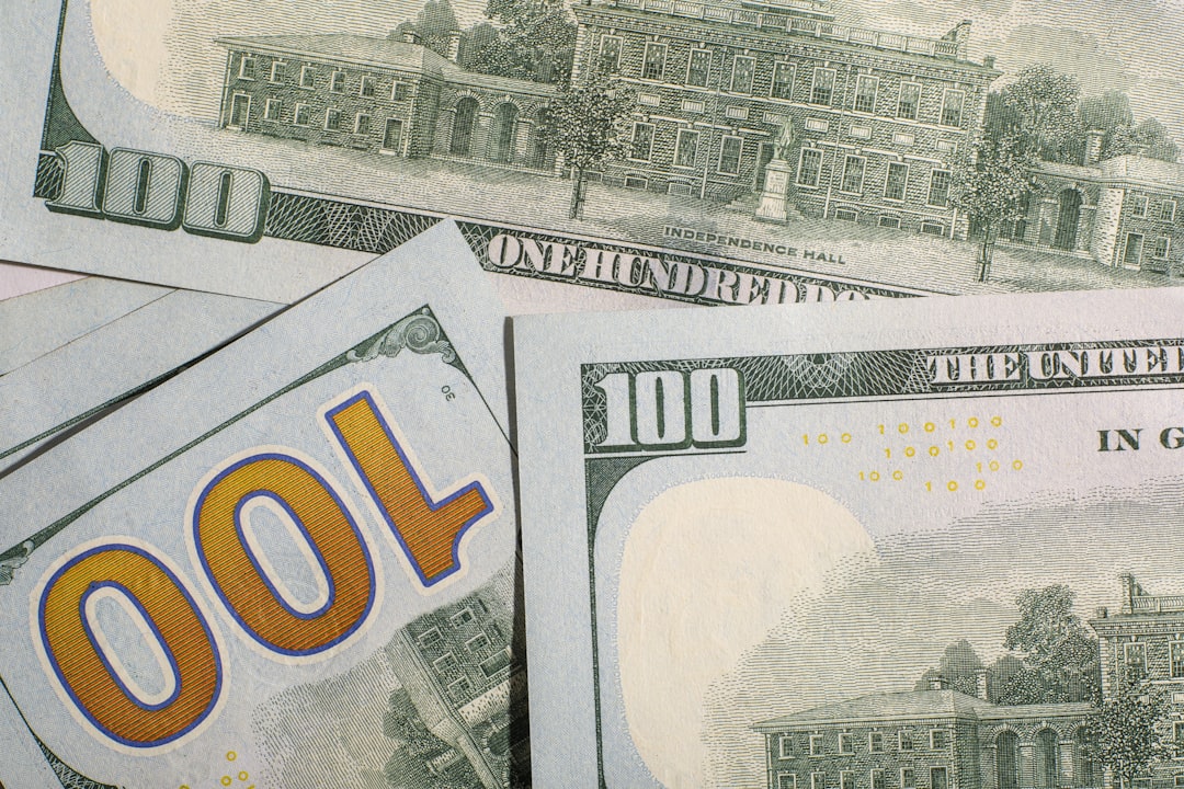 close-up-of-us-hundred-dollar-bills-zxg7zhyo6za